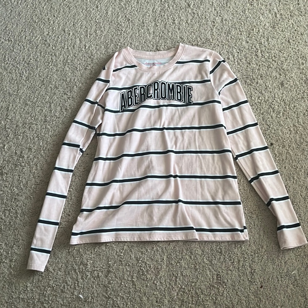 long sleeve pink striped top.